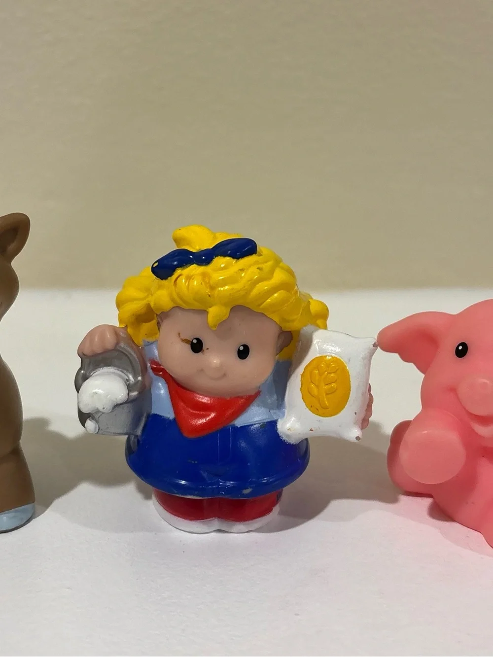 Fisher-Price Blue and Yellow Girl Figurine with Red Scarf
